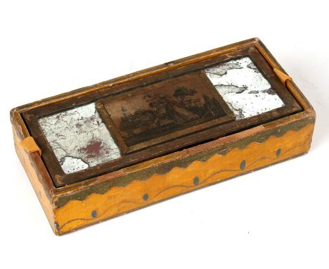 An 18th century pencil box with painted decoration on a yellow ground, the mirrored top with central pen work panel depicting