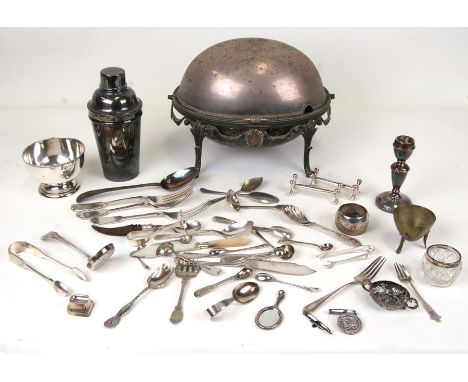 A quantity of assorted silver and silver plated items to include a silver plated turn-over dish, flatware; a dwarf candlestic