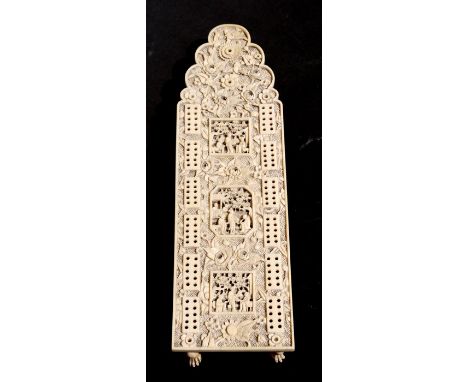 A 19th century Chinese Canton export carved ivory cribbage board decorated with figures within panels with foliate scrolls, 2