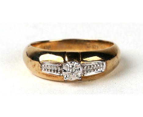 A 9ct gold diamond ring. Approx UK size O  3g