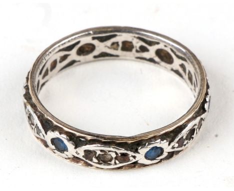 A gold and silver sapphire and diamond set eternity ring, approx UK size 'Q'.Condition ReportOne diamond missing