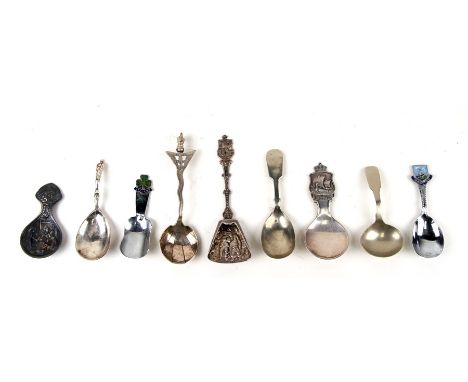 A group of silver plated and white metal caddy and teaspoons to include a Dutch example.