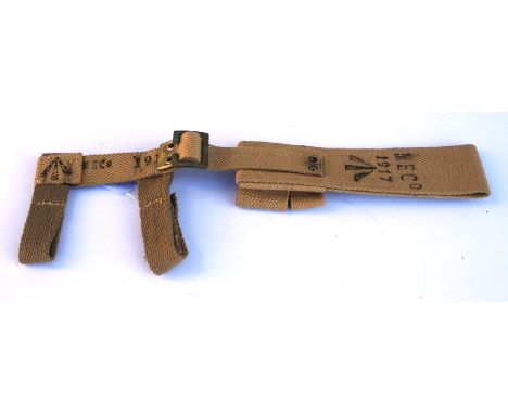 An 08 Pattern bayonet frog with helve strap and carrier. Marked to the reverse of the frog with the War Department arrow and 