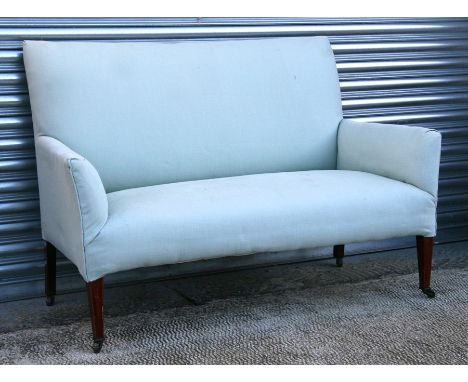 An Edwardian upholstered two-seater sofa on square tapering legs, 130cms (51ins) wide.Condition ReportGood overall condition 