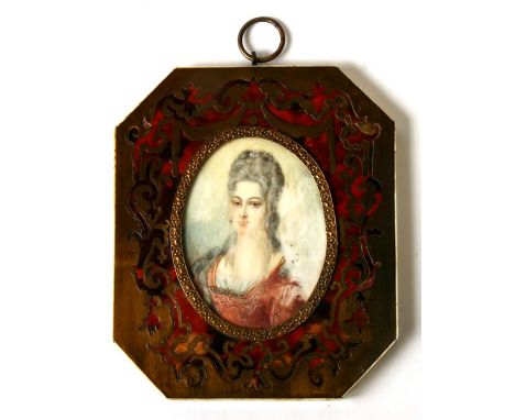 A 19th century portrait miniature depicting a lady with flowers in her hair, 6 by 8.5cms (2.5 by 3.5ins), mounted in a boulle
