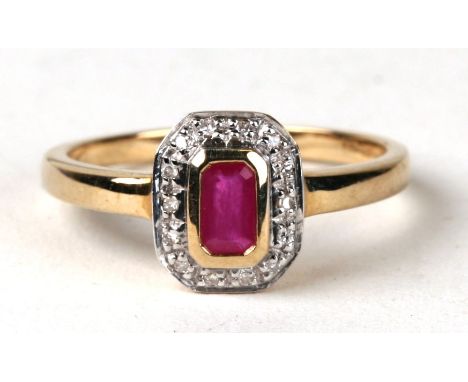 A 9ct gold ruby and diamond ring. Approx UK size N 2.1g