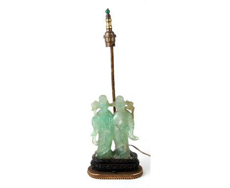 A Chinese figural carved green hardstone / crystal table lamp of two female figures, figures 17cm (6.75ins) high. 