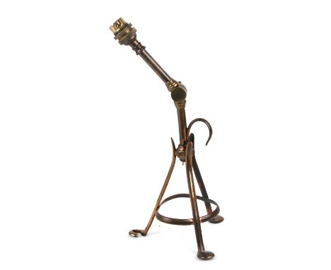 A late 19th/early 20th century brass table lamp with adjustable arm in the style of W A S Benson, 38cm (15 ins) high.Conditio