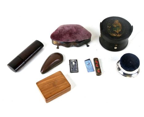 A silver mounted pin cushion; together with an olive wood box; a Georgian travelling inkwell; a mussel shell shaped snuff box