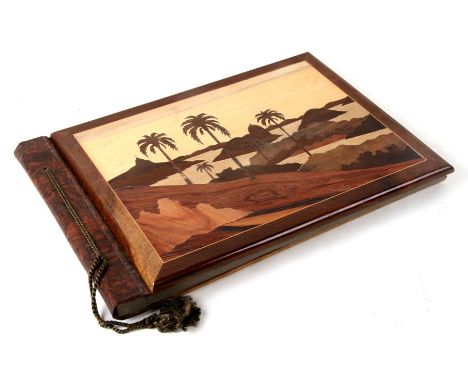 A large marquetry panel photograph/scrap album. 43cm 17 ins) wide
