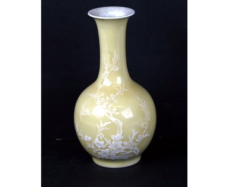 A Chinese monochrome yellow vase decorated flowers, blue seal mark to the underside, 19cms (7.5ins) high.Condition Reportgood