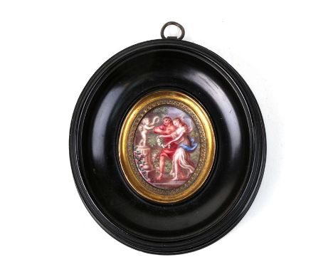 A 19th century portrait miniature enamel plaque in the Watteau style, depicting a romantic couple, mounted in an ebonised fra