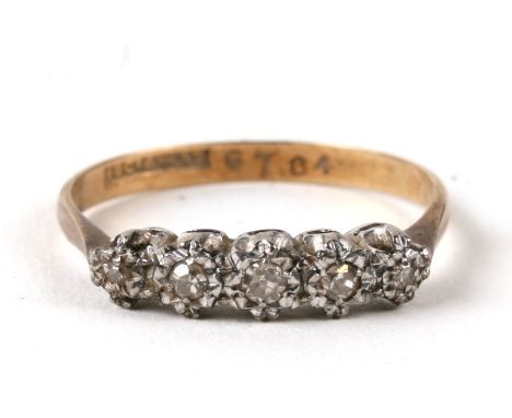 An 18ct gold five stone diamond ring. Approx. UK size P  2.2g