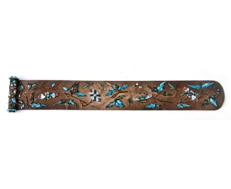 A Chinese silver and enamel hair ornament slide of embossed leaf and flower design with maker's mark to scroll end, 26cms (10