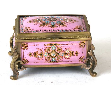 A 19th century French enamel trinket box in the manner of Tahan of Paris, the pink ground with applied beading and gilt highl