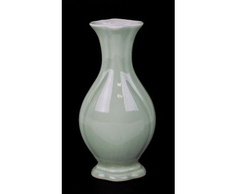 A Chinese pale celadon glazed vase with blue seal mark to the underside, 20cms (8ins) high.Condition ReportGood condition