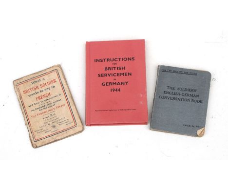 A WW1 British Soldier BEF French phrase book together with a post WW2 Soldiers English German conversation book and a reprodu