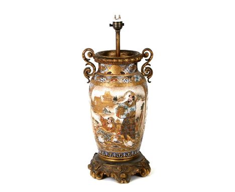 A 19th cntury Japanese Satsuma vase mounted and converted to a table lamp, with rococo ormolu mounts, the body of the vase de