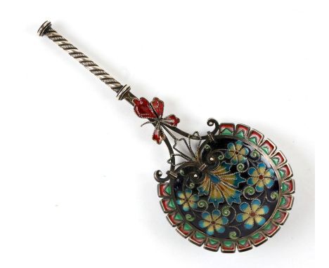 A Plique-à-jour silver caddy spoon. 10cm (4 ins) longCondition ReportThree sections at the base are missing glass, one red pe