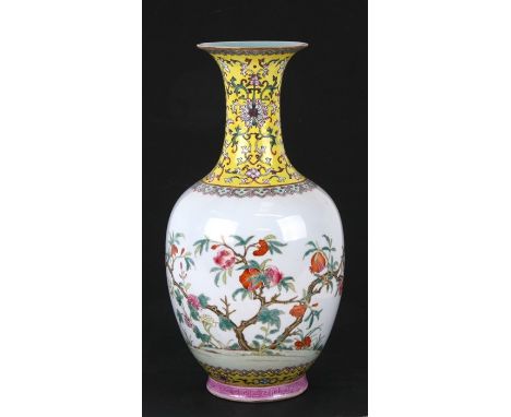 A Chinese Republic famille rose vase decorated with pomegranates, red seal mark to the underside, 33cms (13ins) high.Conditio