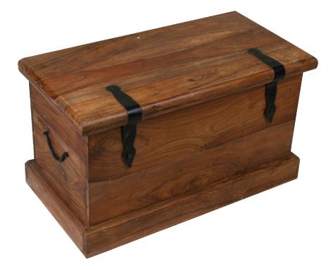 A hardwood ironbound trunk of small proportion, 60cms (24ins) wide, together with a hardwood occasional table