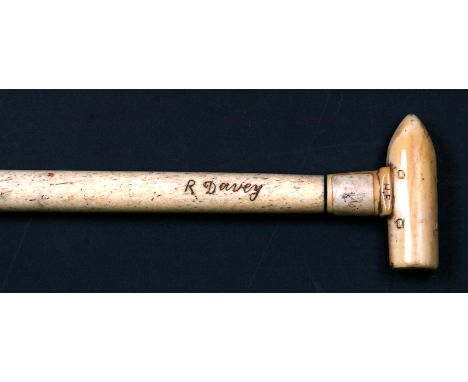 A whalebone walking stick signed 'R Davey' with a later trench art handle in the form of a bullet, 83cms (32.5ins) long.