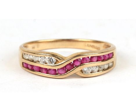 A 9ct gold ring set with cross-over panels of pink and white stones, approx UK size 'P'.