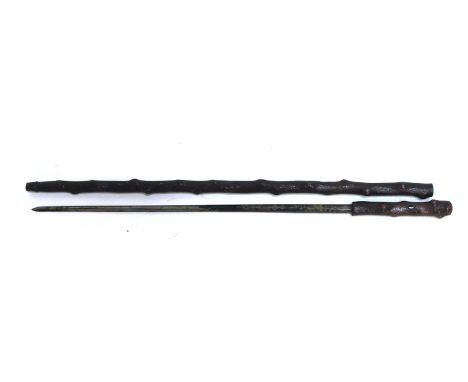 A knotted wood (possibly Blackthorn) sword stick with tapering tapering steel blade. 85cm ( 33.5 ins) long. Blade length 55cm