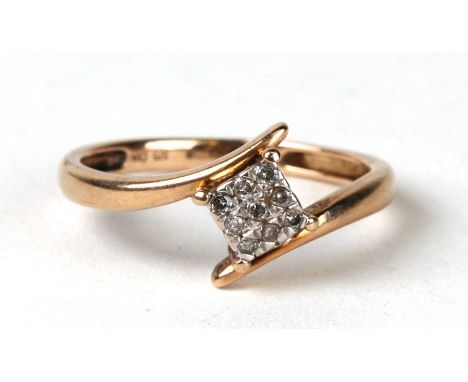 A 9ct gold diamond ring. Approx UK size N  1.8