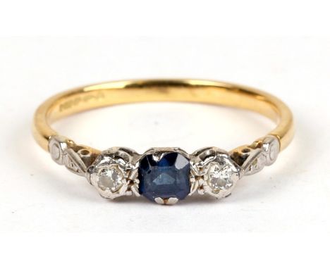 An 18ct gold sapphire and diamond ring, approx UK size 'T'.