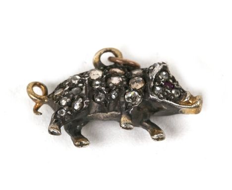 A diamond pig pendant / charm, pave-set overall with graduated round-cut diamonds and ruby eyes, in unmarked yellow and white