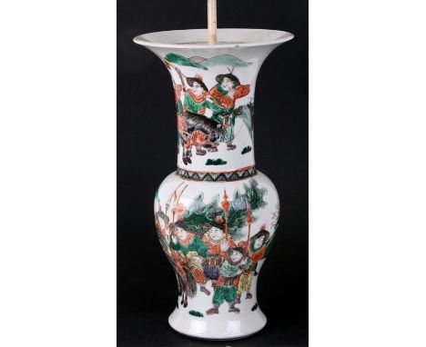An 18th century famille vert vase of flared form decorated with warriors, converted to a lamp, 44cm (17.25ins) high.