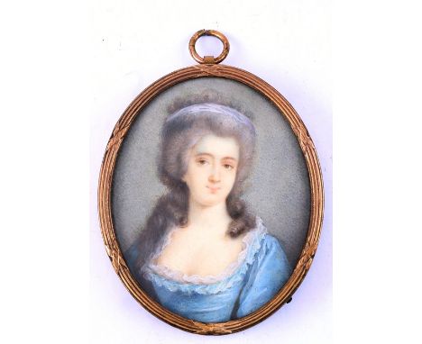 A portrait miniature depicting a lady wearing a blue dress, 5 by 6.5cms (2 by 2.5ins).