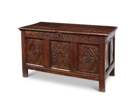 A Charles II oak chest&nbsp; &nbsp; &nbsp; &nbsp; &nbsp; &nbsp; &nbsp;
The three-panel front profusely carved with foliate de