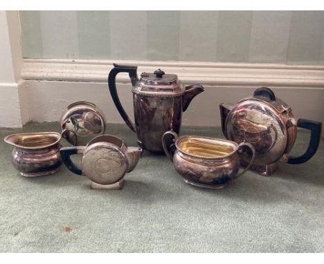 A three piece Art Deco silver plated Tea Service, and another three piece silver plated Tea Service. (6) 