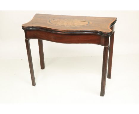 A fine Irish George III period serpentine shaped inlaid mahogany fold-over Card Table, in the manner of William Moore, Dublin