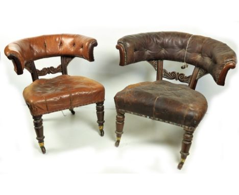 A good rare pair of William IV period Irish mahogany&nbsp;Library Desk Chairs, each horse shoe shaped leather button back and