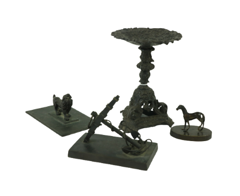 A small bronze Study of a Ship's Anchor,ÿon rectangular bronze base, 4 1/2" (11cms), together with a small bronze Figure of a