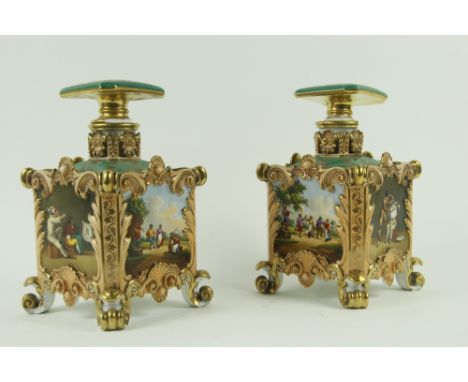 A fine pair of decorative Jacob petit French polychrome porcelain Flasks and stoppers, each of square form with canted corner