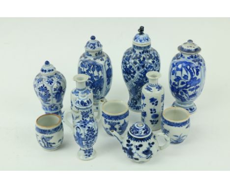 A selection of six blue and white miniature Vases, (four with covers); a miniature blue and white Ewer and Cover; a miniature