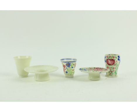 A tall 18th Century / early 19th Century decoratedÿglass Cup and Stand, with colourful flowers against a cream ground, anothe