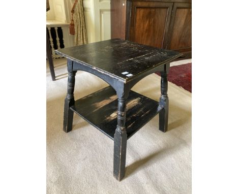 A small square ebonised two tier Aesthetic movement Occasional Table, on four turned legs, united by stretcher shelf, 23" (58