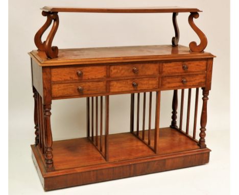 An Irish mahoganyÿLibrary Stand, probably by Gillingtons, Dublin, struck with No: 3776, the rectangular moulded top shelf on 