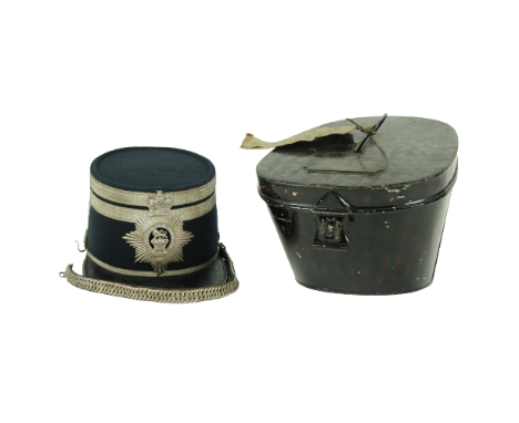 A WW1 British Army Officer's Shako peak Hat, of Rt. Hon. Earl of Howth, 4th Hussars, in lacquered metal case. (1) 