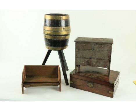 A 19th Century brass bound barrel shaped Planter, on three square tapering legs, together with a miniature four drawer Chest,