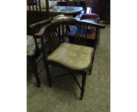 EDWARDIAN MAHOGANY CORNER CHAIR WITH INLAID DETAIL AND UPHOLSTERED SEAT RAISED ON FOUR RING TURNED LEGS   