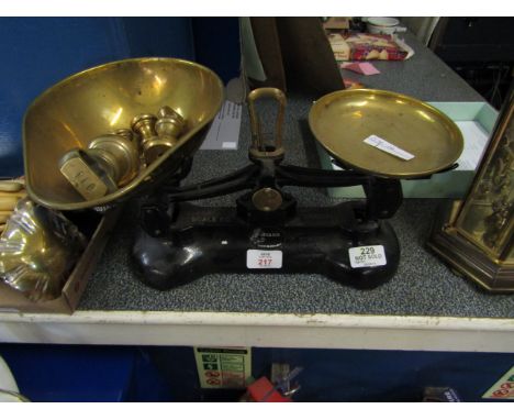 CAST IRON SET OF SCALES WITH BRASS TRAYS AND BELL WEIGHTS   