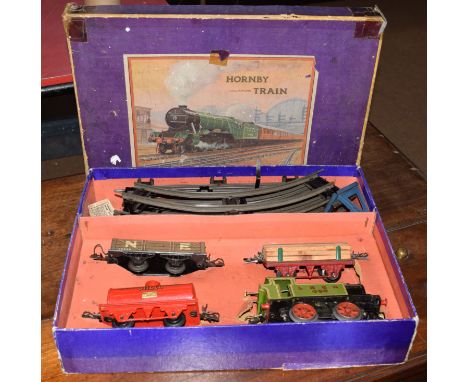 Large collection of Hornby '0' gauge clockwork train sets and additional rolling stock, accessories and track all in excellen