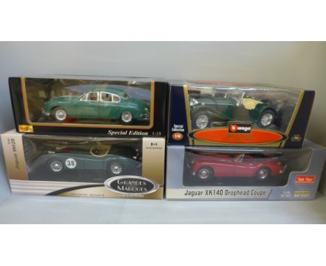 Four 1/18th scale model Jaguar cars, including Ertl and Sun Star 