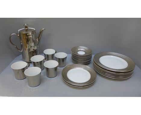 A Royal Worcester silver finish coffee set, one cup chip to rim 